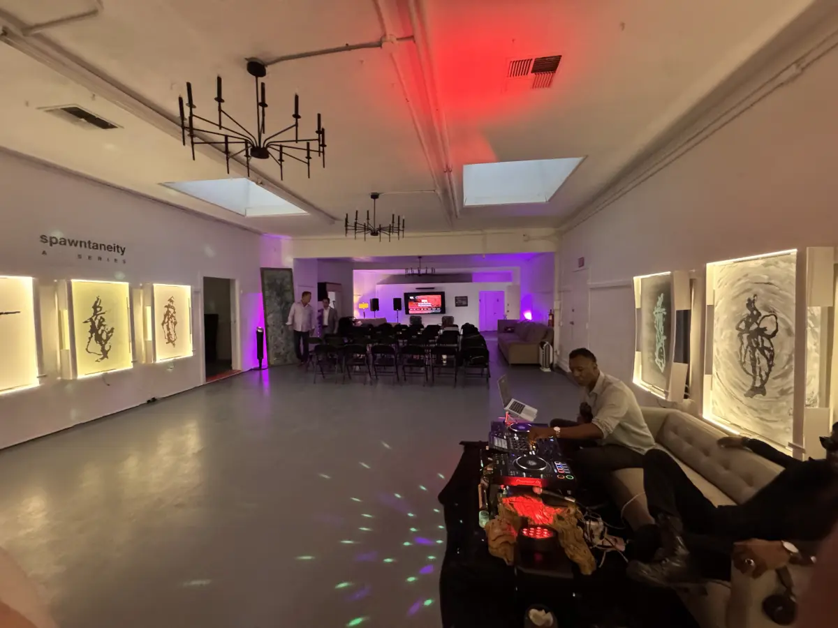 DJ setup and ambient lighting inside Art and Space LA gallery event venue